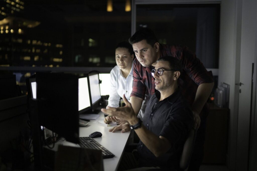 IT technicians discussing an issue