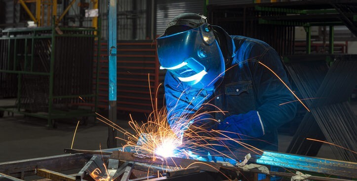 industrial welder on factory floor